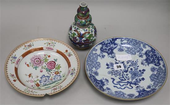 A Chinese enamel vase and two Chinese dishes